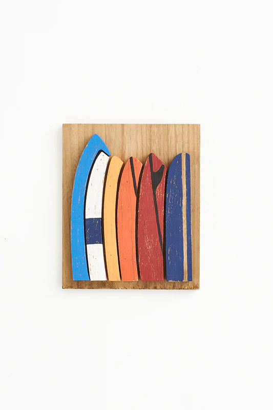 Carved wood panel with surfboards